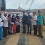 Foto Pengurus IKMR, IWMR dan IPMR menyalurkan Zakat Mal