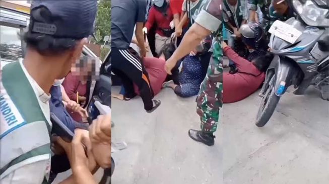 Foto istri sah melabrak diduga pelakor sampai berguling di aspal