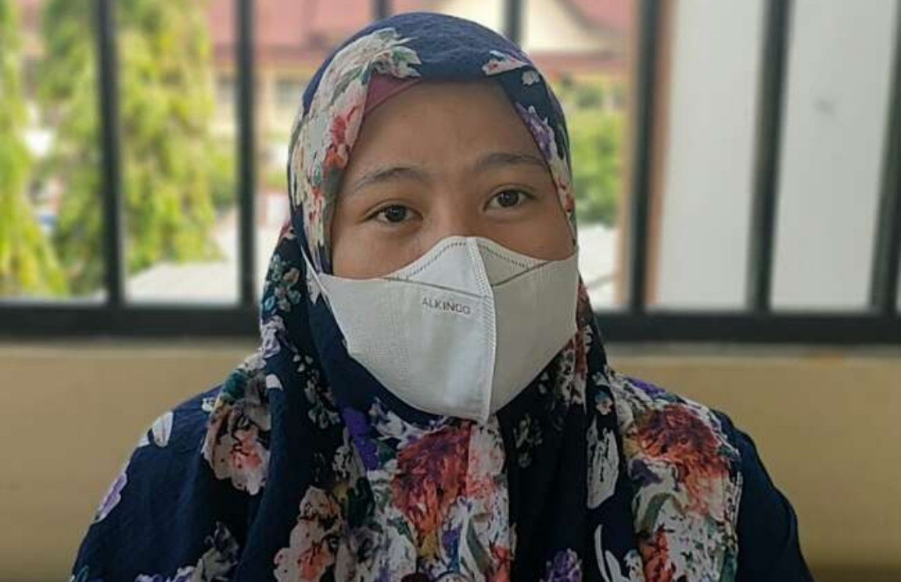 Foto Ibu muda bernama Monalisa saat di Polrestabes Palembang. (dok oganilirco jpnn.com)