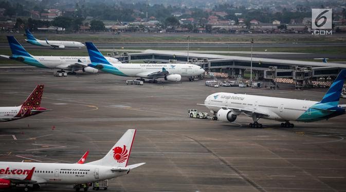 Foto Pesawat maskapai Garuda Indonesia terparkir di areal Bandara Soekarno Hatta, Tangerang, Banten. (Dok: liputan6.com)