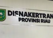 Foto : Tulisan dinding Disnakertrans Provinsi Riau.